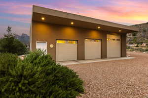 Garage at dusk with a mountain view