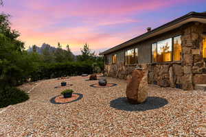 View of yard at dusk