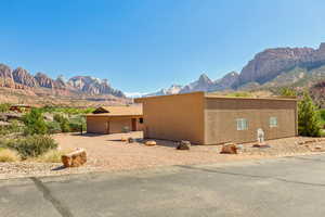 View of home's exterior with a mountain view