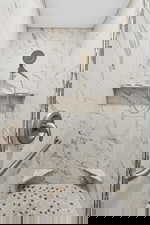 Bathroom with a tile shower