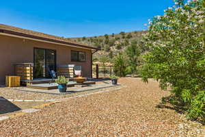 View of yard featuring a patio area and a mountain view