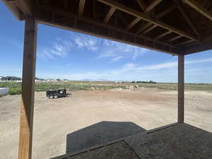 View of patio / terrace with a mountain view and a view of countryside