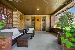 Porch featuring an outdoor hangout area