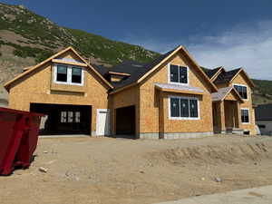 Property under construction with a mountain view