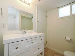 Bathroom featuring vanity and tile patterned floors