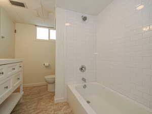 Full bathroom with vanity and shower / bath combination