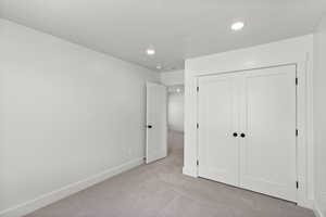 Bedroom with carpet and recessed lighting