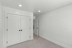 Bedroom with carpet and recessed lighting