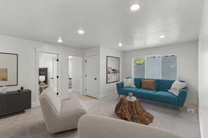 Living room with carpet floors and recessed lighting