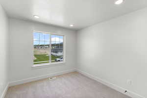 Bedroom with carpet and recessed lighting
