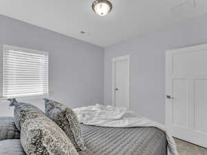 View of carpeted bedroom