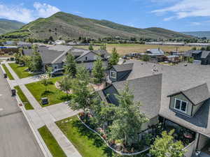 Aerial perspective of suburban area with mountains