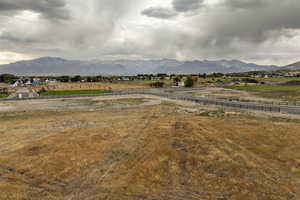 View of mountain background featuring rural landscape