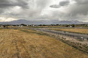 View of mountain background featuring rural landscape
