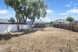 View of fenced backyard