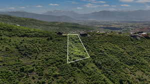 View of property location with a mountain backdrop and property parcel outlined