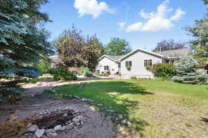 View of green lawn and backyard