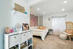 Bedroom featuring carpet flooring and recessed lighting