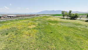 View of yard featuring a view of countryside and a mountain view