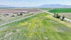 View of rural area with abundant farmland and a mountain backdrop