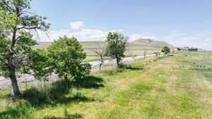 View of yard with a view of countryside