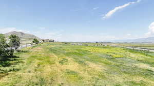View of yard with a view of countryside and a mountain view
