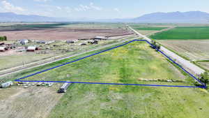 View of rural area featuring property parcel outlined and a mountain backdrop