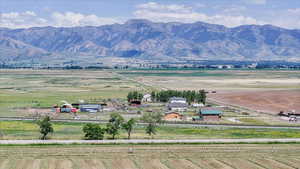 View of mountain background featuring rural landscape
