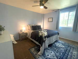 Bedroom featuring carpet flooring and ceiling fan