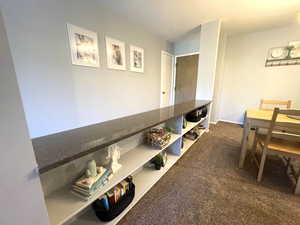 View of carpeted dining space