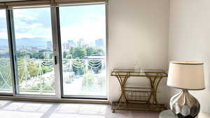 Entryway with a skyline view and healthy amount of natural light