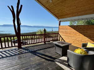 En Suite Deck with chairs and a propane fire pit