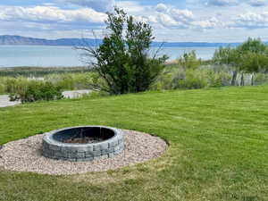 Fire pit and a water and mountain view