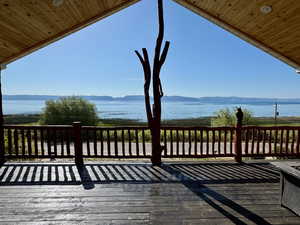 En Suite Deck with a water and mountain view