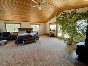En suite bedroom featuring access to deck