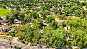 Aerial view of residential area with a tree filled landscape