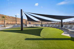 View of yard featuring an area to practice putting
