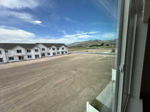 View of building exterior featuring a mountain view