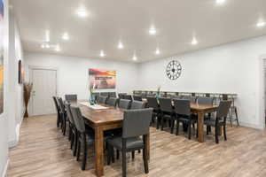 Oversized dining are with room for a projector for meetings