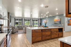 Kitchen featuring quartz counter tops