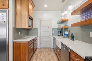 Kitchen featuring lots of counter space and walk-in pantry