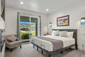 Ensuite bedroom #2 with TV, and electric fireplace