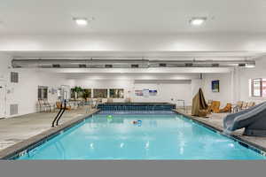 Waterdance Rec Center Indoor pool featuring a water slide