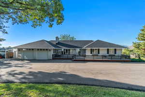 Stunning brick rambler with spacious deck - perfect for soaking in the mountain views