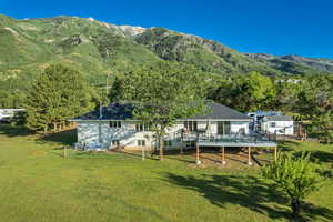 View of mountain backdrop with a heavily wooded area