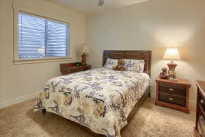 Bedroom with carpet floors and ceiling fan