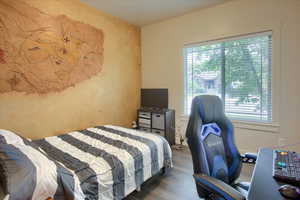 Bedroom featuring wood finished floors