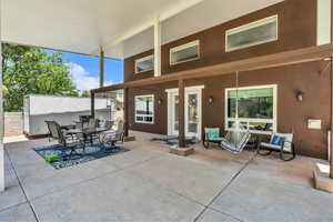View of patio with outdoor dining space