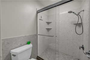 Bathroom featuring a stall shower