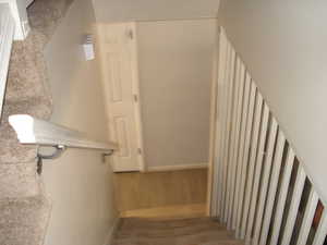 View of staircase and level 1 bathroom